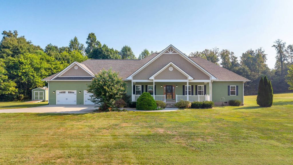 Professionally enhanced home exterior by a real estate photo editing company.