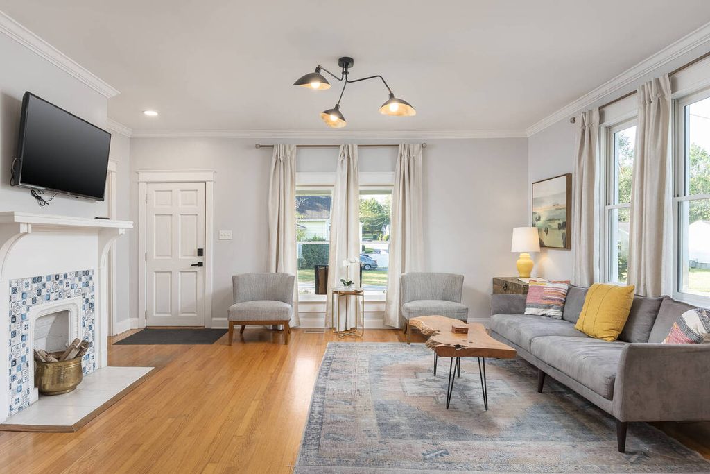 Living room enhanced by a real estate photo editing company for brighter, balanced results.