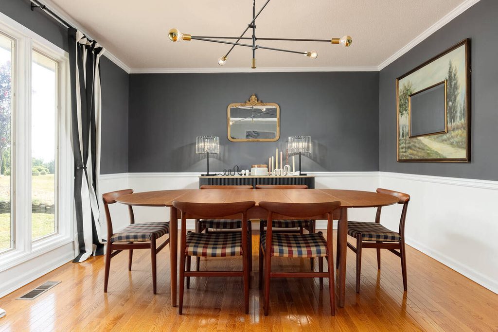 Dining room image enhanced by a real estate photo editing company for a property listing.