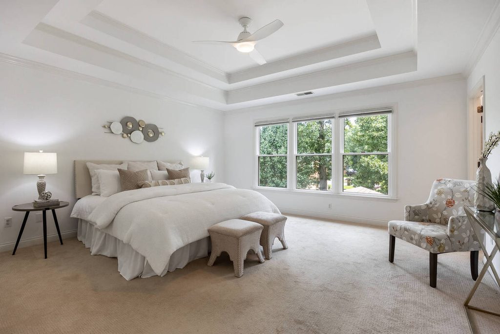 Bright bedroom photo demonstrating outsourcing and DIY editing results