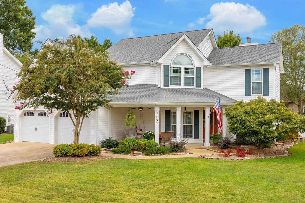 Bright, professionally edited house exterior selected during AI photo culling.