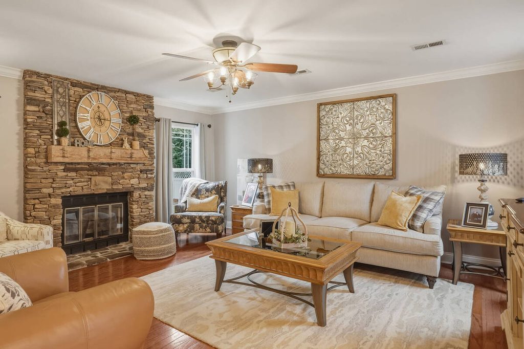 Living room photograph featuring a stone fireplace reviewed during AI photo culling.