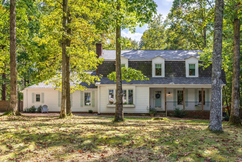 House exterior photograph surrounded by trees for AI photo culling and image selection.