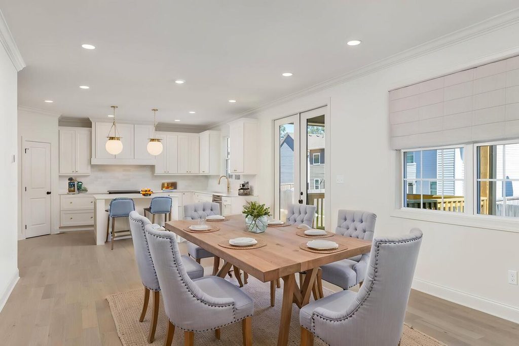 Virtual staging with a wooden dining table and upholstered chairs