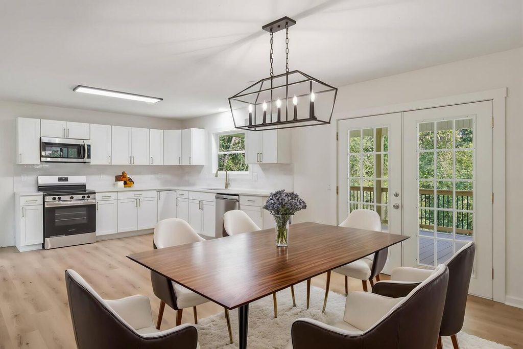 Virtual staging with a sleek wooden table and modern dining chairs