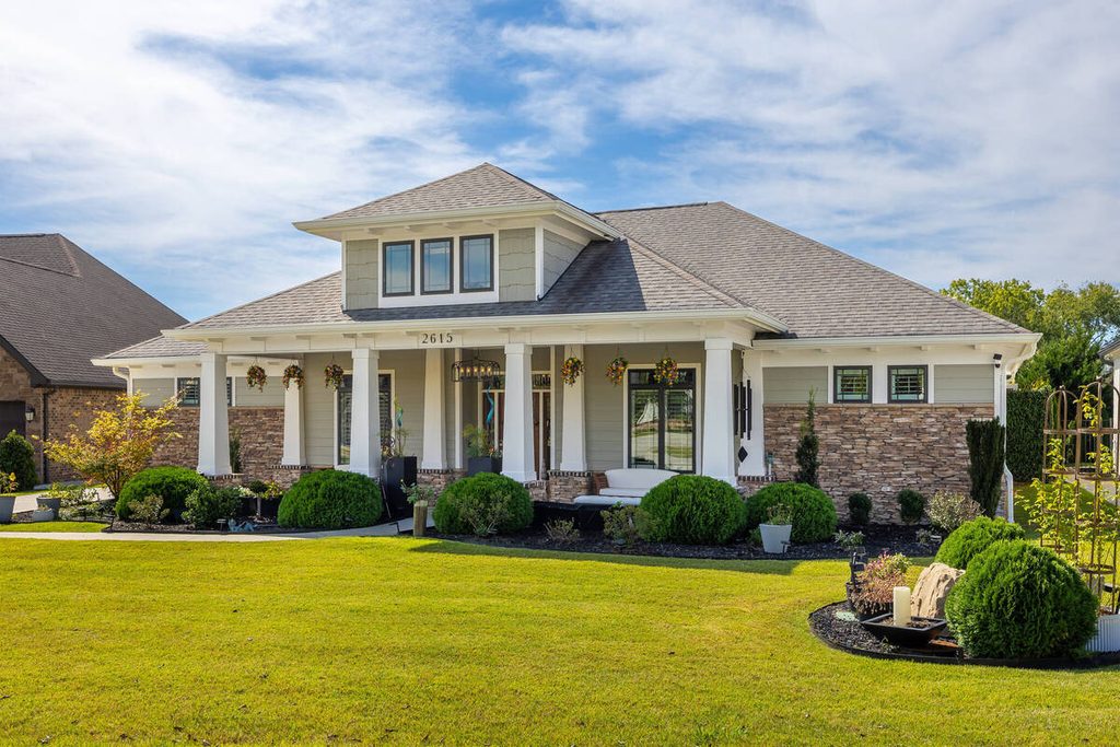 AI sky replacement enhances a residential exterior with a bright blue sky