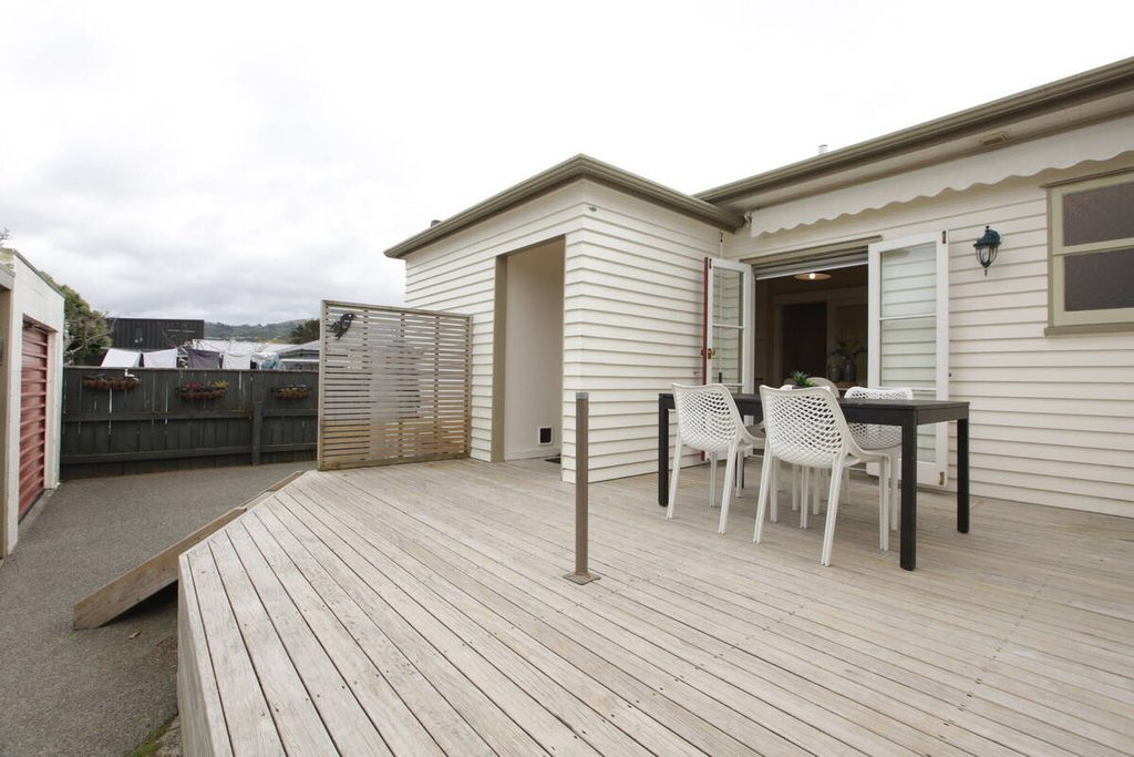 Original outdoor patio with cloudy skies before AI sky replacement