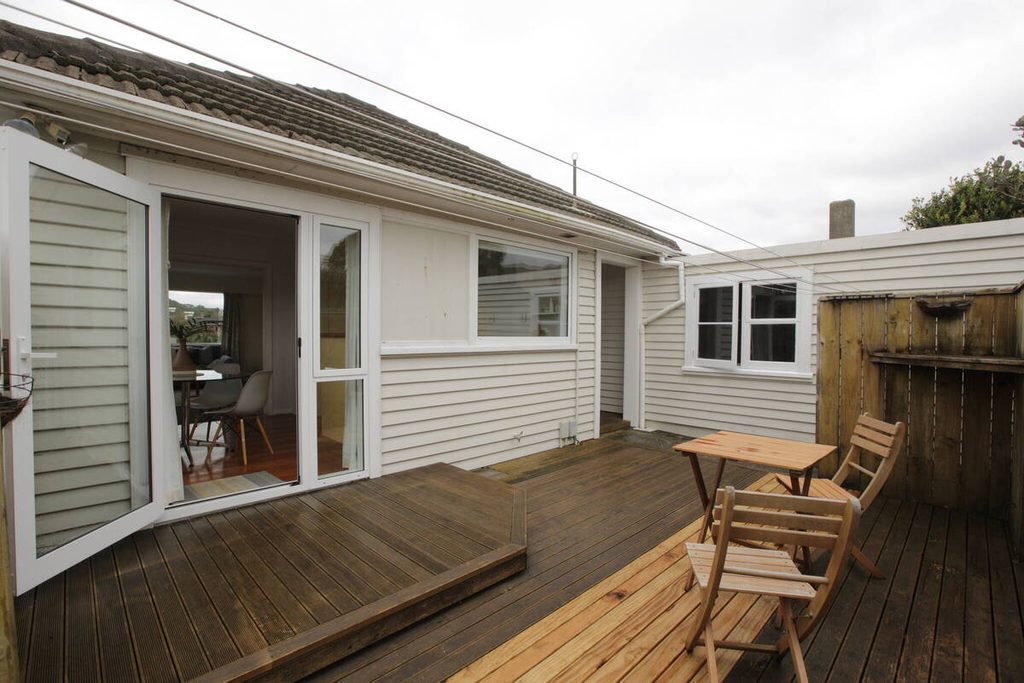 Original wooden deck photo with an overcast sky before AI sky replacement