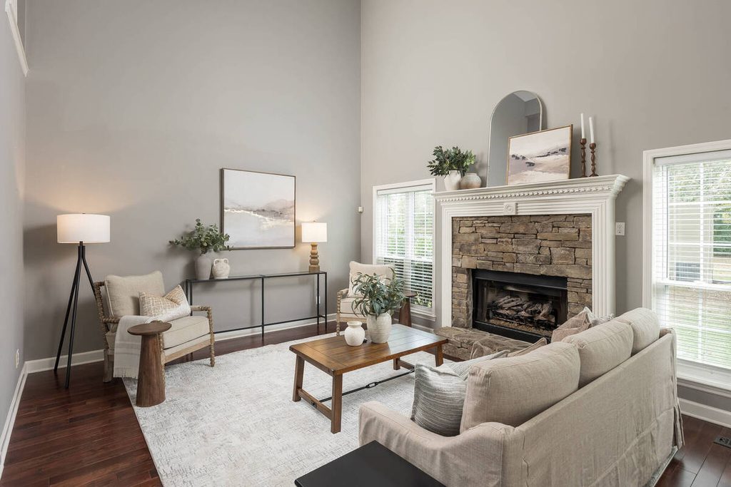 Cozy family room with stone fireplace.