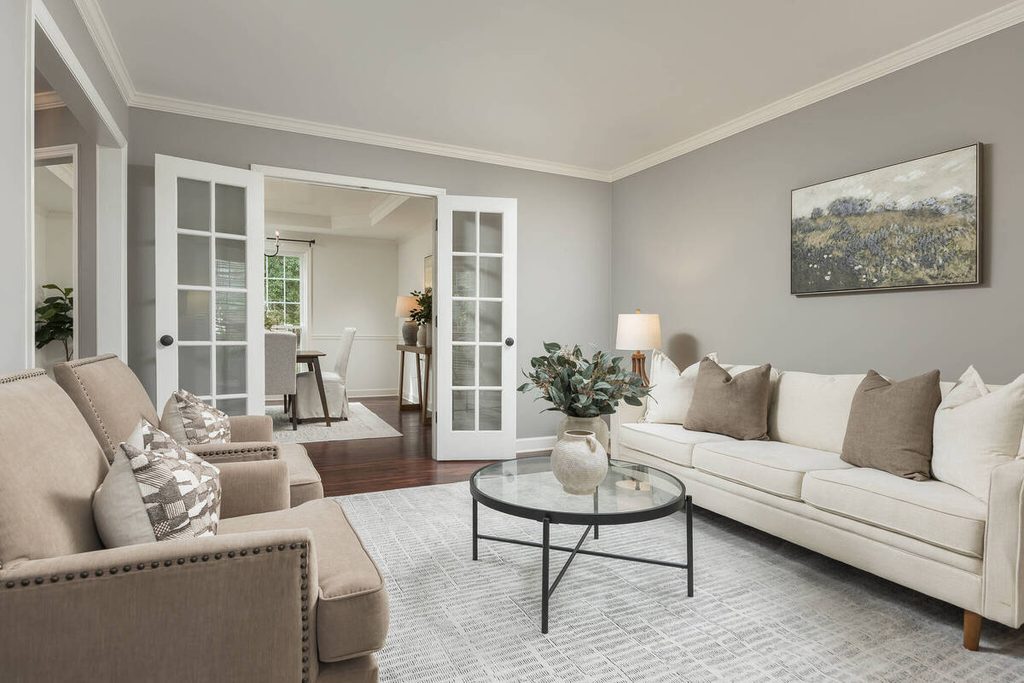 Bright living room with neutral furniture.