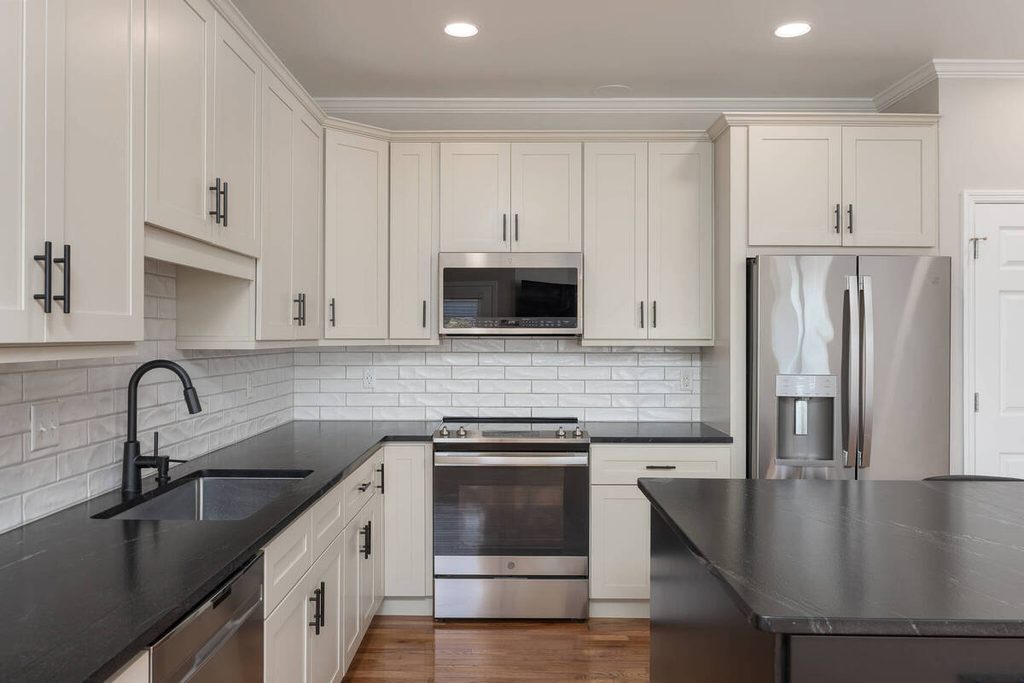 AI exposure correction in a kitchen with white cabinets