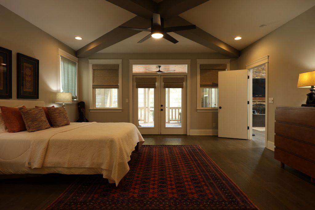 Dark bedroom before AI exposure correction
