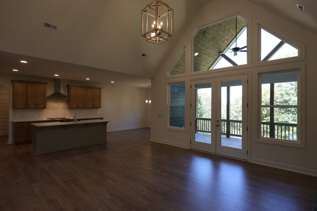 Dark open-plan interior before exposure correction